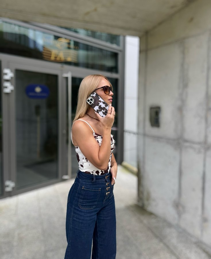 Instagram post by @gintarefiseriene for BURGA. Caption reads: @burgaofficial – the case that goes with [...].