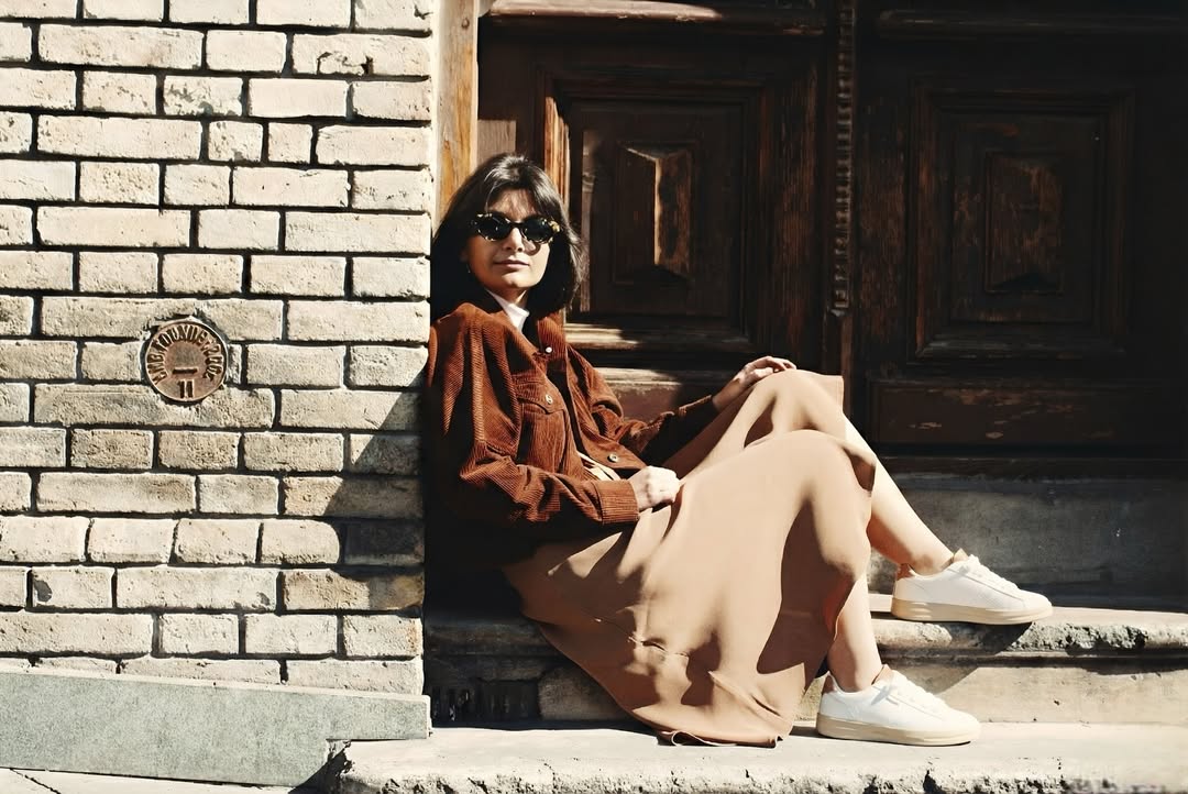 Instagram post by @heyitsninnna for HEYDUDE. Caption reads: Stepping into cozy comfort with my @heydude....