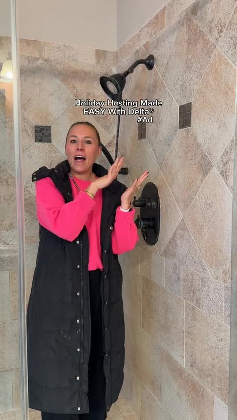 Instagram post by @heyitskayzie for Delta Faucet. Caption reads: [...] a shower head would be hard?! Not....