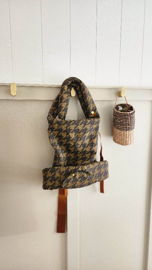 Instagram post by @thestylesociete for Chekoh. Caption reads: [...] gorgeous Brooklyn carrier. Thank you....