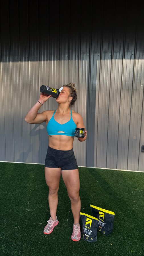 Instagram post by @syddneyssmith for Ascent Protein. Caption reads: OFFICIALLY PARTNERED WITH ONE OF MY FAVORITE....