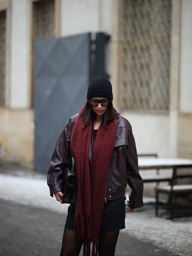 Instagram post by @sabrinawayneee for NA-KD. Caption reads: too cold outside — quick stop at @berlinfashionwe....