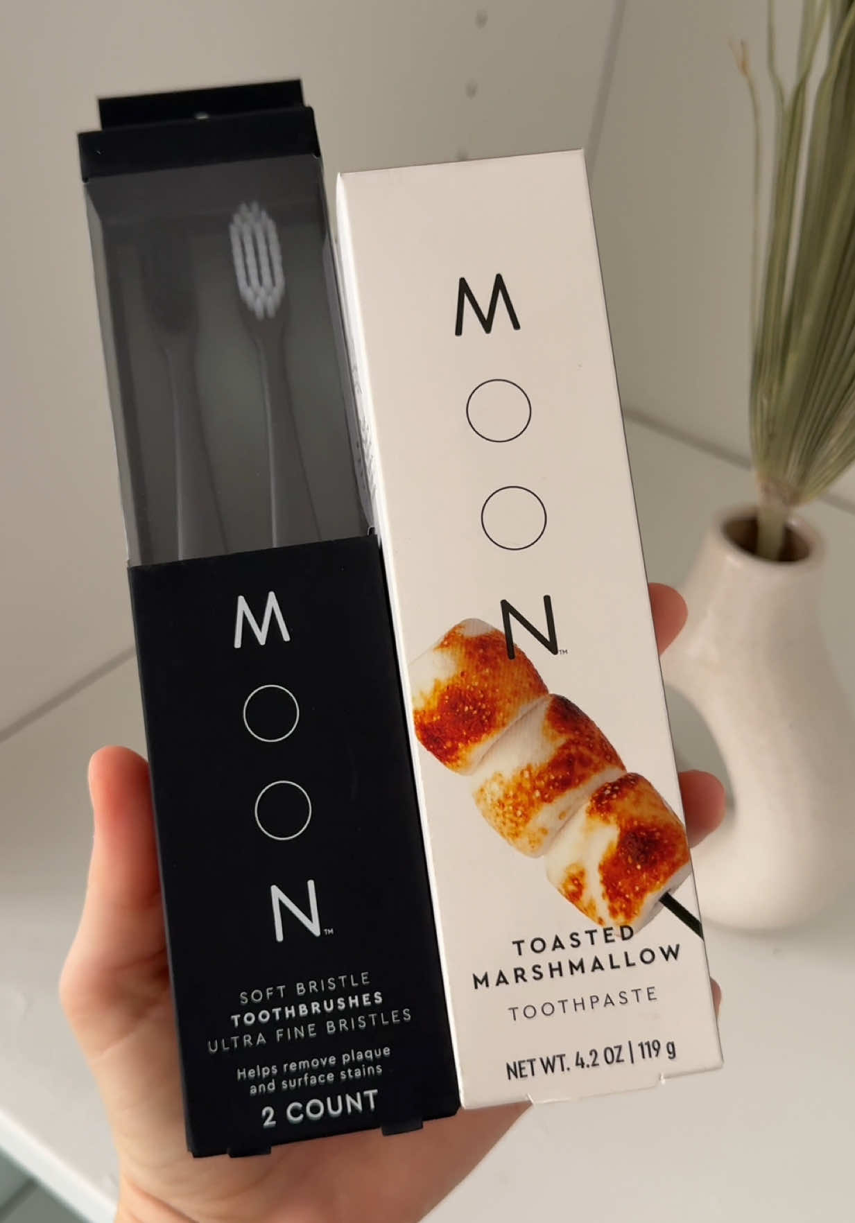 TikTok post by @usa.ugc.reviewer for MOON Oral Beauty. Caption reads: [...] Marshmallow toothpaste?! Yeah - @Moon Oral....