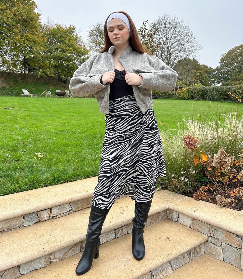 Instagram post by @ellisia_lifestyle for Gini London. Caption reads: [...] you can go wild with zebra print? 🦓....