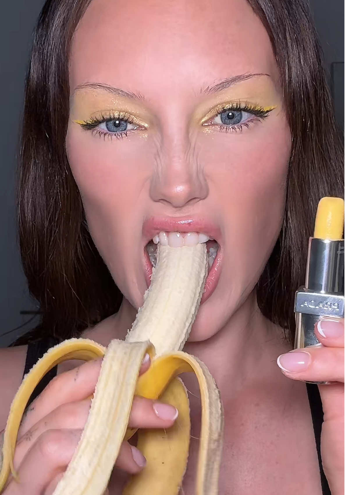 TikTok post by @meredithduxbury for Sephora. Caption reads: #PradaBeautyPartner the yummiest banana ever is....