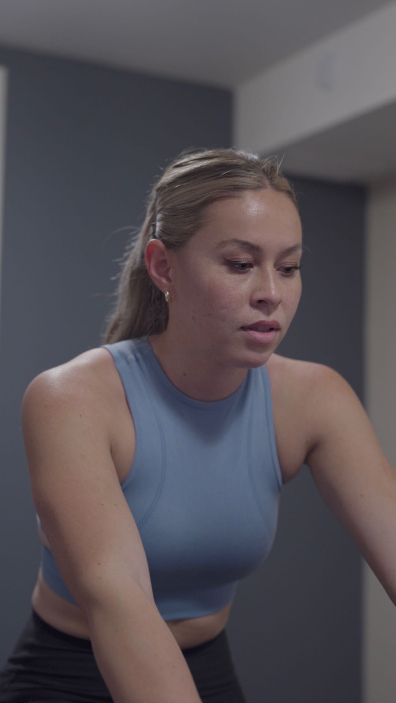 Instagram post by @lesleyatkins for Peloton. Caption reads: #Ad The @OnePeloton Bike+ has become a key part of....