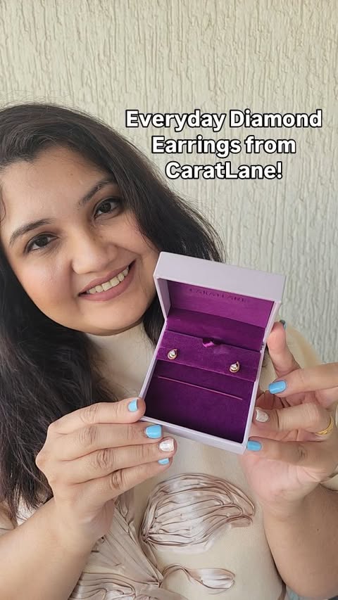 Instagram post by @myarabianadventures for CaratLane. Caption reads: [...] gold & diamond stud earrings from....