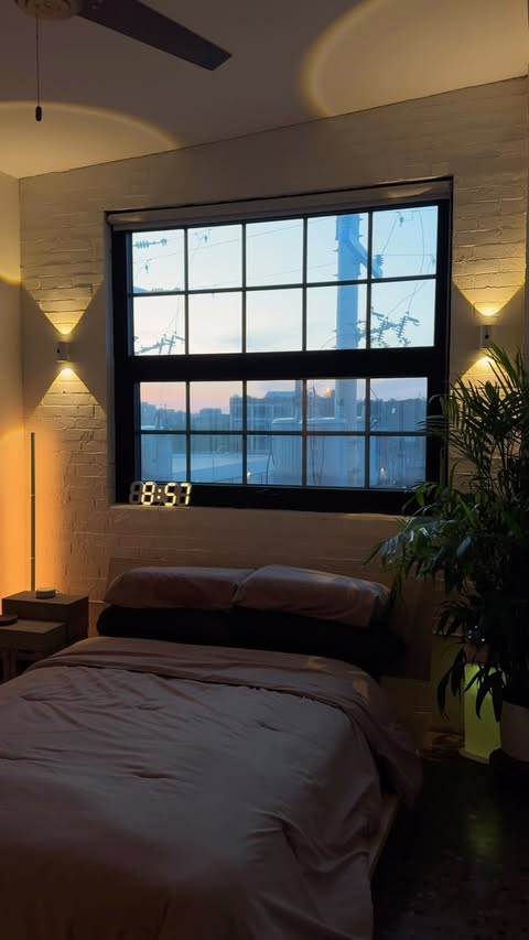 Instagram post by @natehome for EZVALO. Caption reads: [...] with this gorgeous wall light from....
