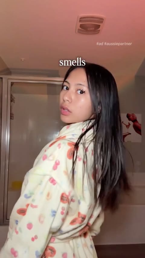 Instagram post by @soleilssofia for Aussie Hair. Caption reads: [...] busy girl daily hair essential 🎀🫧....