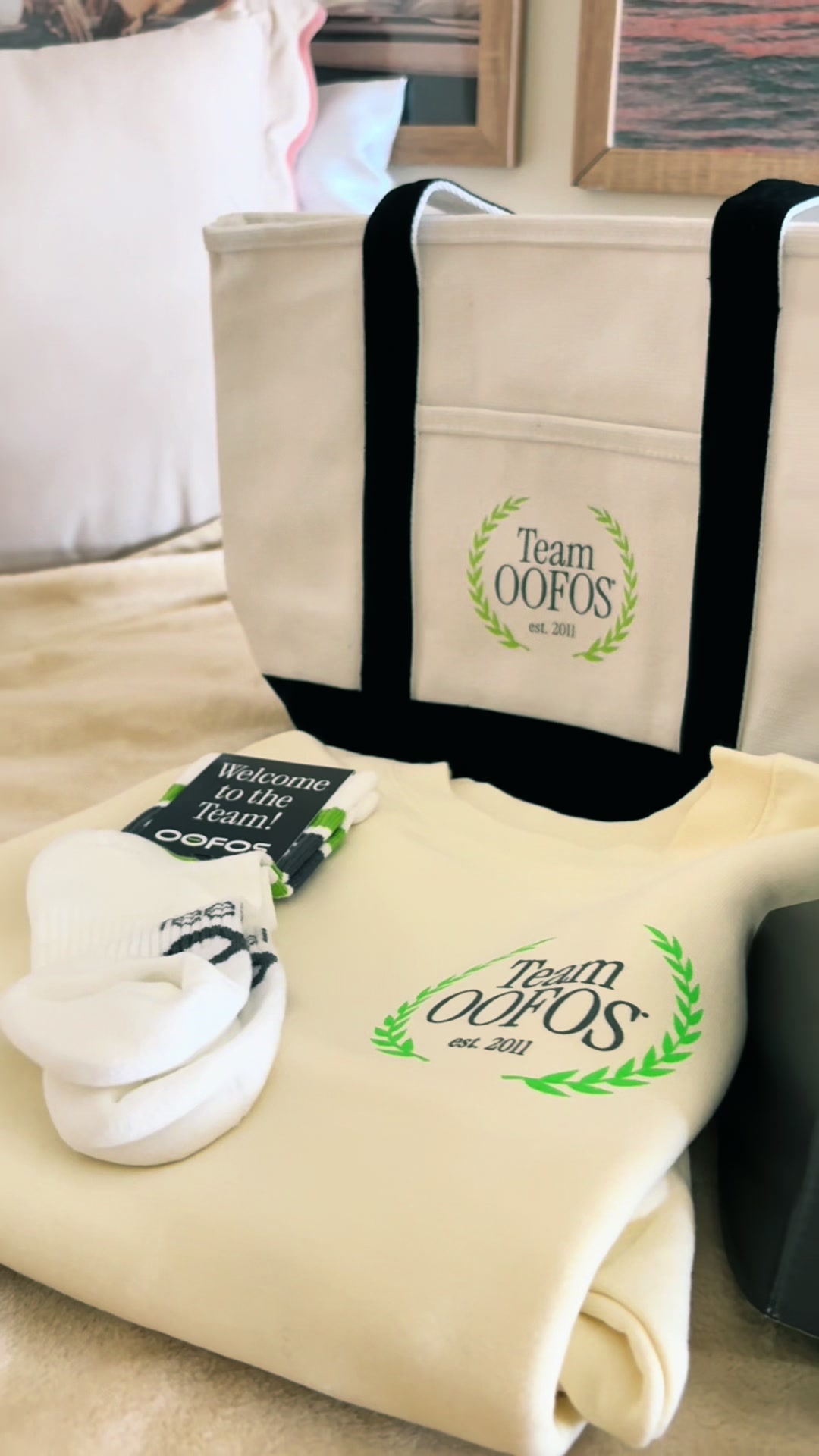 TikTok post by @anna.thomas17 for Her Campus. Caption reads: Thank you so much @OOFOS & @hercampus !!! As a....