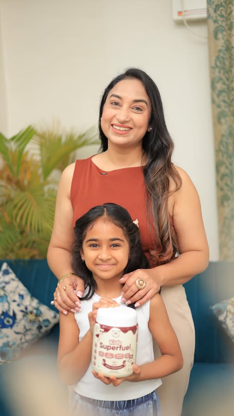 Instagram post by @dr.roliguptaa for Wellbeing Nutrition. Caption reads: [...] giving her Kids Superfuel by Wellbeing....