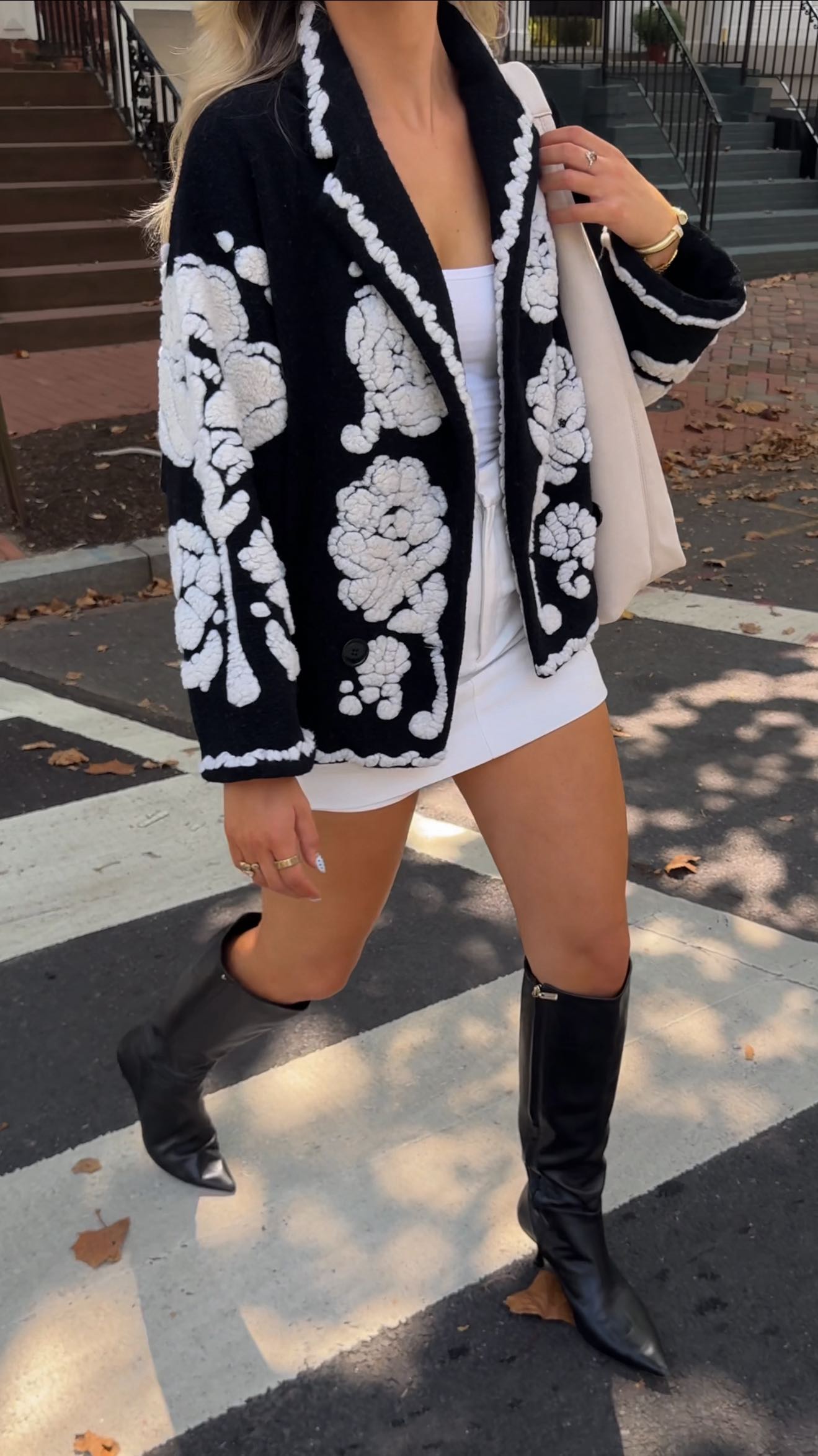 Instagram post by @peytonjohnsonnn for FARM Rio. Caption reads: hello coat szn 🍂🌞🤎 @farmrio coats are the....