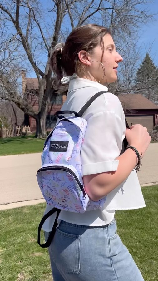 Instagram post by @isabeljones_sm6 for JanSport. Caption reads: Take care of your mental wellbeing <3 #Ad....