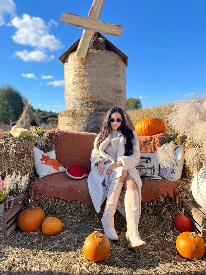 Instagram post by @paulina_mularczyk for SAWAY. Caption reads: Pumpkins, sunshine & my favorite boots....