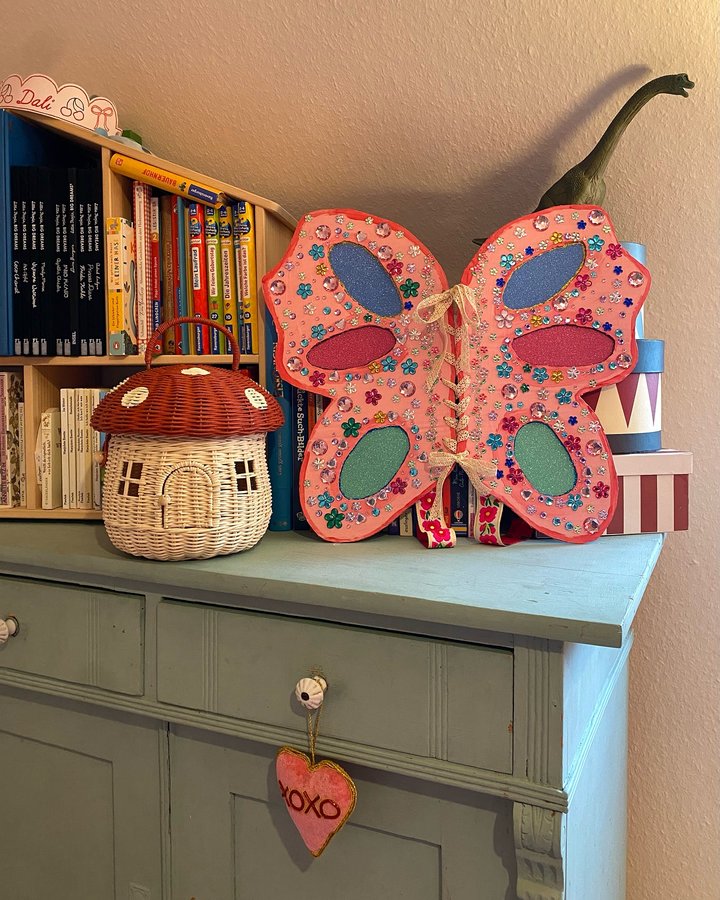 Instagram post by @celinebukulow for Olli Ella. Caption reads: We had lots of fun making these fairy wings out of....