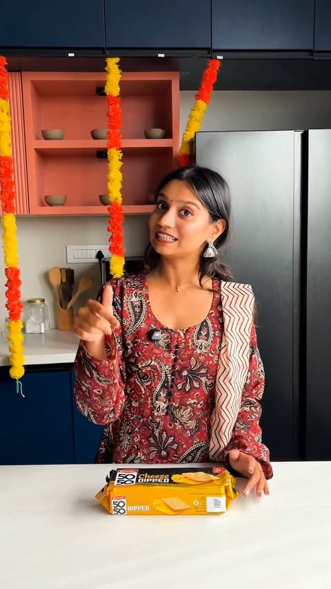Instagram post by @eatkochieat for Britannia SnackInc. Caption reads: Crunchy, melty, and packed with a whole new twist,....
