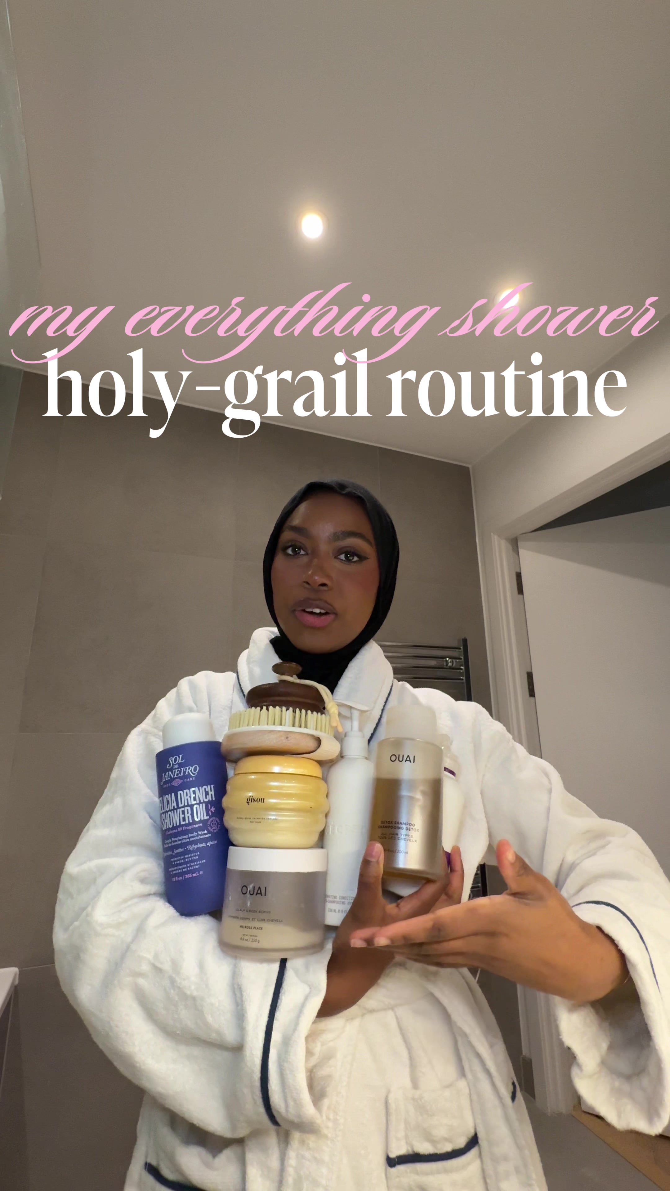 TikTok post by @aishaxahmada for Philip Kingsley. Caption reads: [...]  🧼🛀🧖🏾‍♀️🤍✨ @Tatcha US  @THE OUAI ....