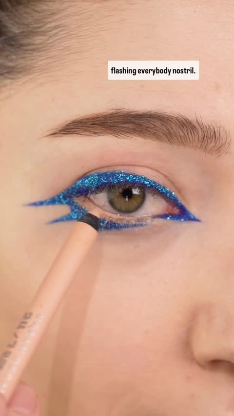 Instagram post by @micaelaladavisbeauty for About-face Beauty. Caption reads: [...] • were gifted/pr 💙Matte blue-....