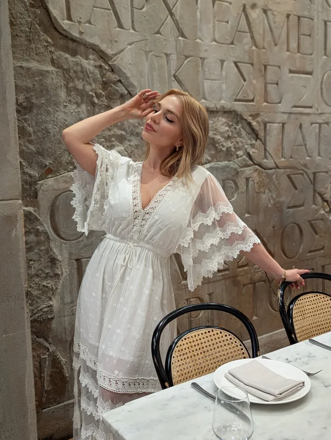 Instagram post by @stylishjournal for Salty Crush. Caption reads: Greek walls were perfeft to quickly post in this....