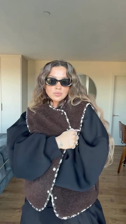 Instagram post by @maureenmoores_ for Vivi Mari. Caption reads: AD styling one @vivimariofficial teddy vest 3....