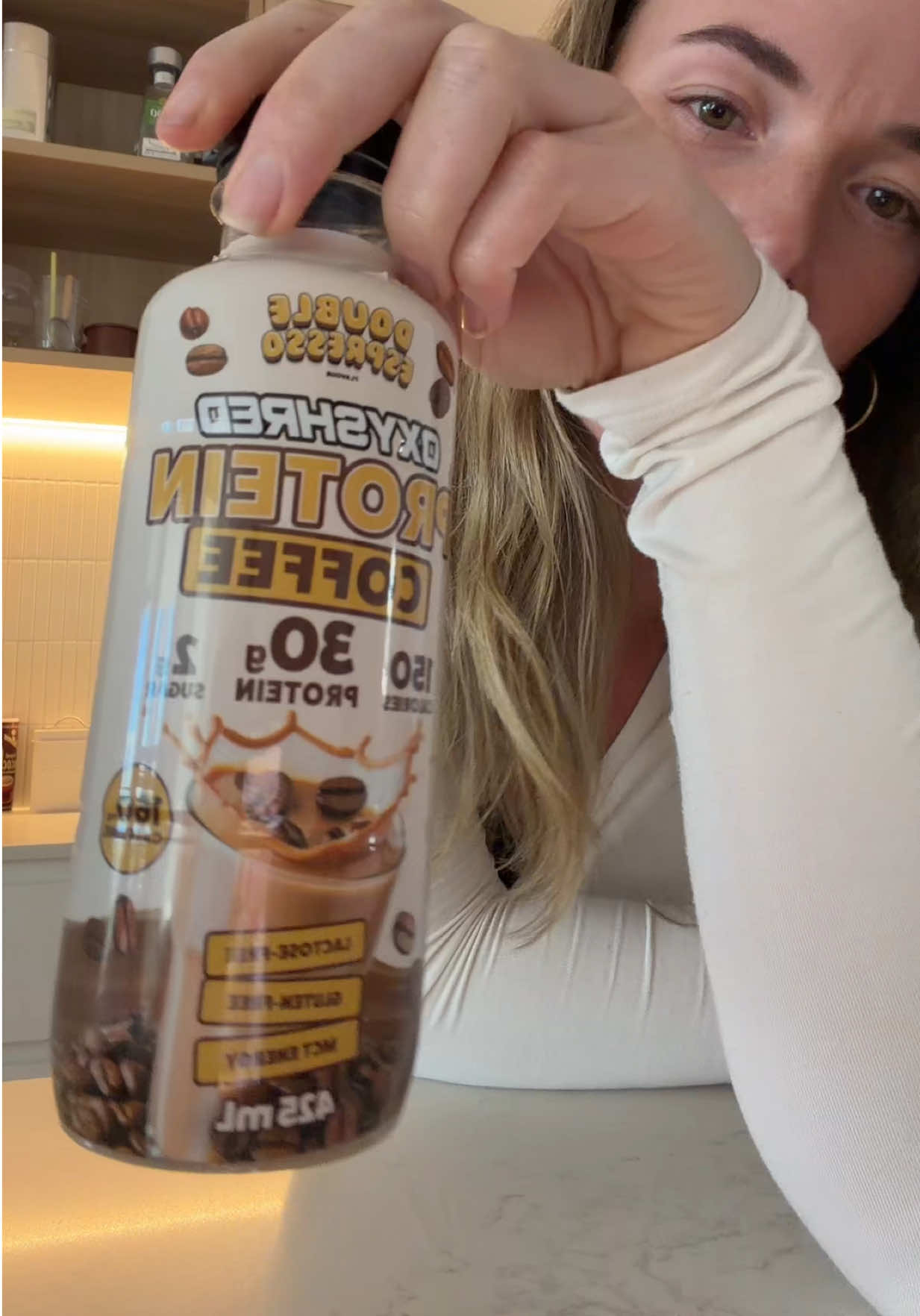 TikTok post by @ellieebostockk for OxyShred Energy. Caption reads: [...] protein goals hit 👏👏👏👏 @ehplabs....