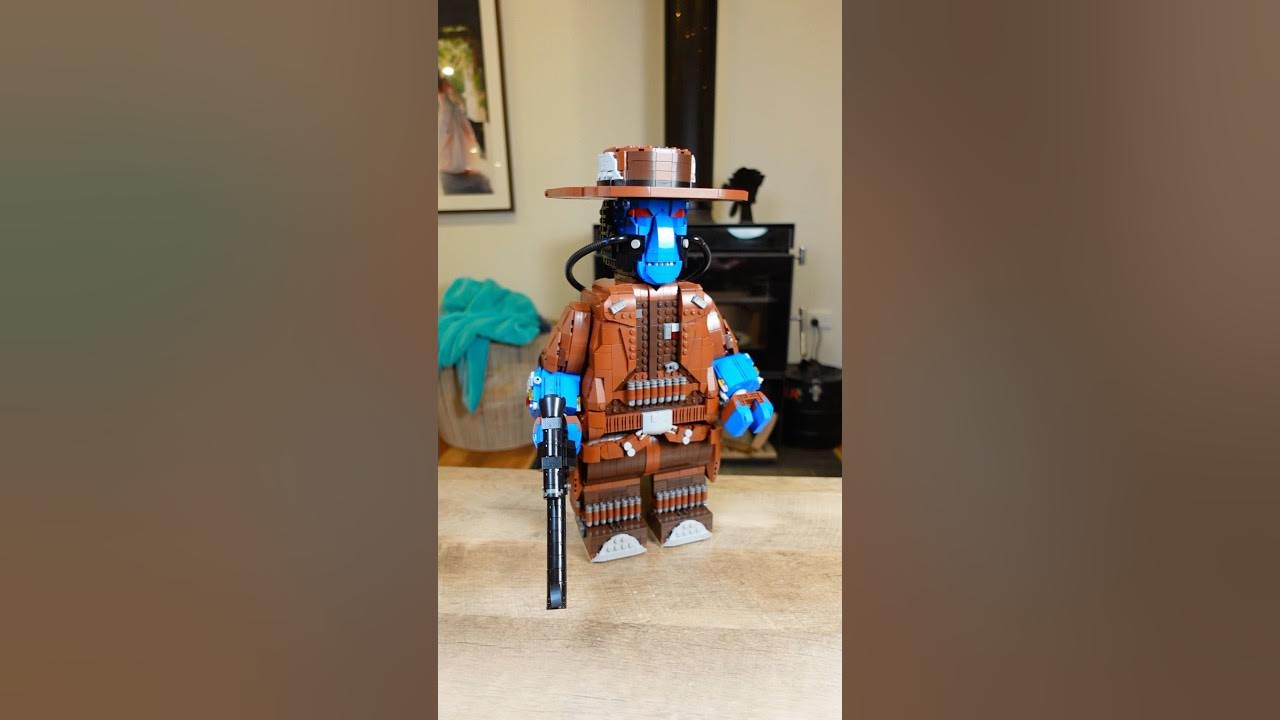 YouTube post by @BricksandTwins for Minifigs.me. Caption reads: We built a GIANT Cad Bane from Clone Wars.