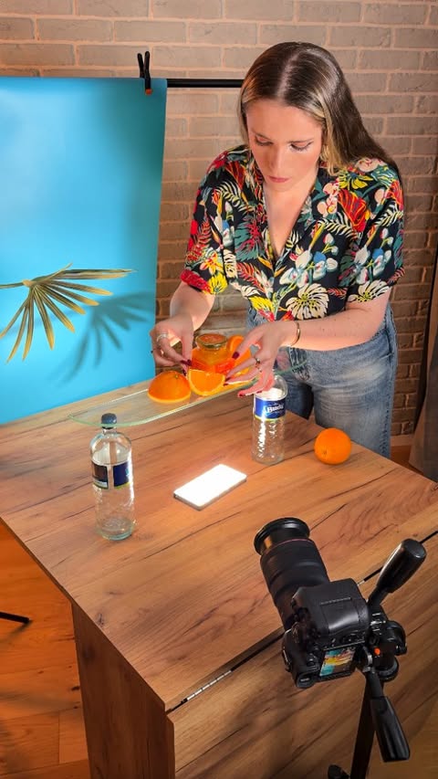 Instagram post by @ttart_photo for Photoroom. Caption reads: Regular photographer:
slicing oranges… arranging....