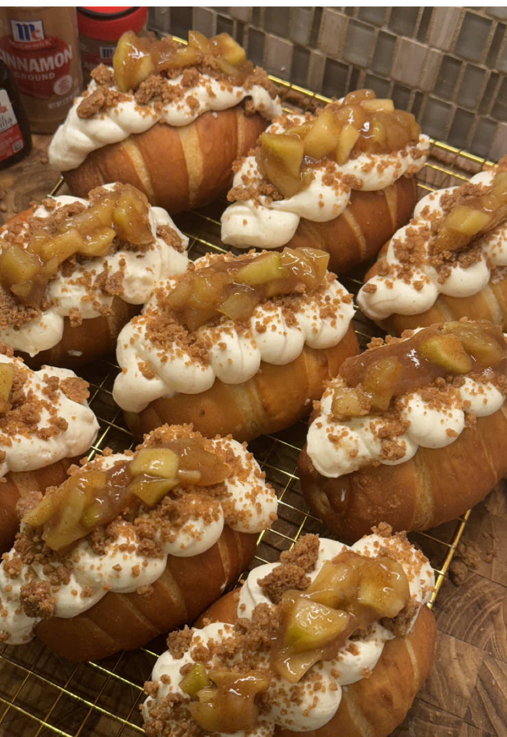 TikTok post by @erin.lim for McCormick. Caption reads: APPLE PIE SALT BREAD 🍏stuffed with apple pie and....