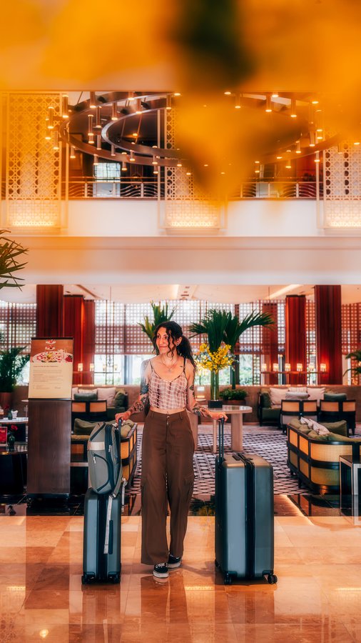 Instagram post by @avecnicole for NOMATIC. Caption reads: I recently spent 2.5 weeks abroad traveling....