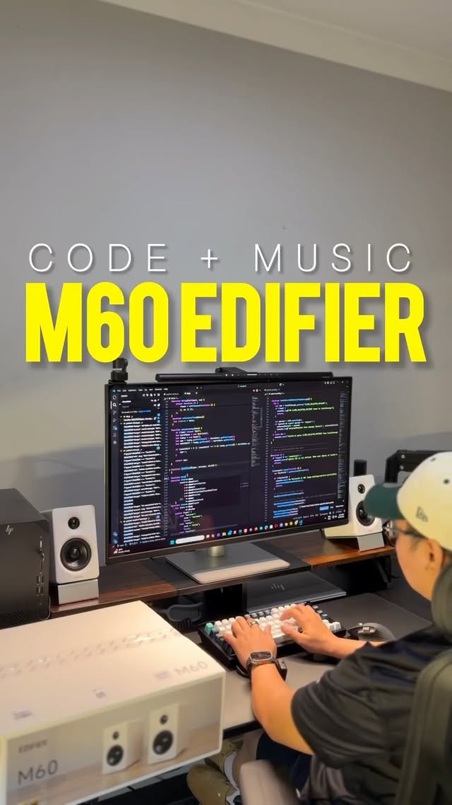 Instagram post by @devjovy for EDIFIER. Caption reads: Code hits different with music 🎶💻 The Edifier....