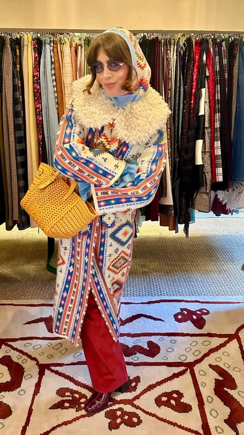 Instagram post by @sarah.corbettwinder for Never Fully Dressed. Caption reads: Incoming 🥁 @neverfullydressed AD.