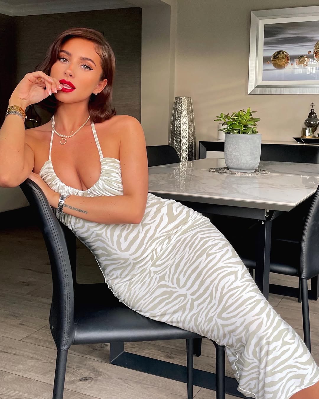 Instagram post by @georgiamayheath for ISAWITFIRST. Caption reads: My dress is from my collection with @isawitfirst....