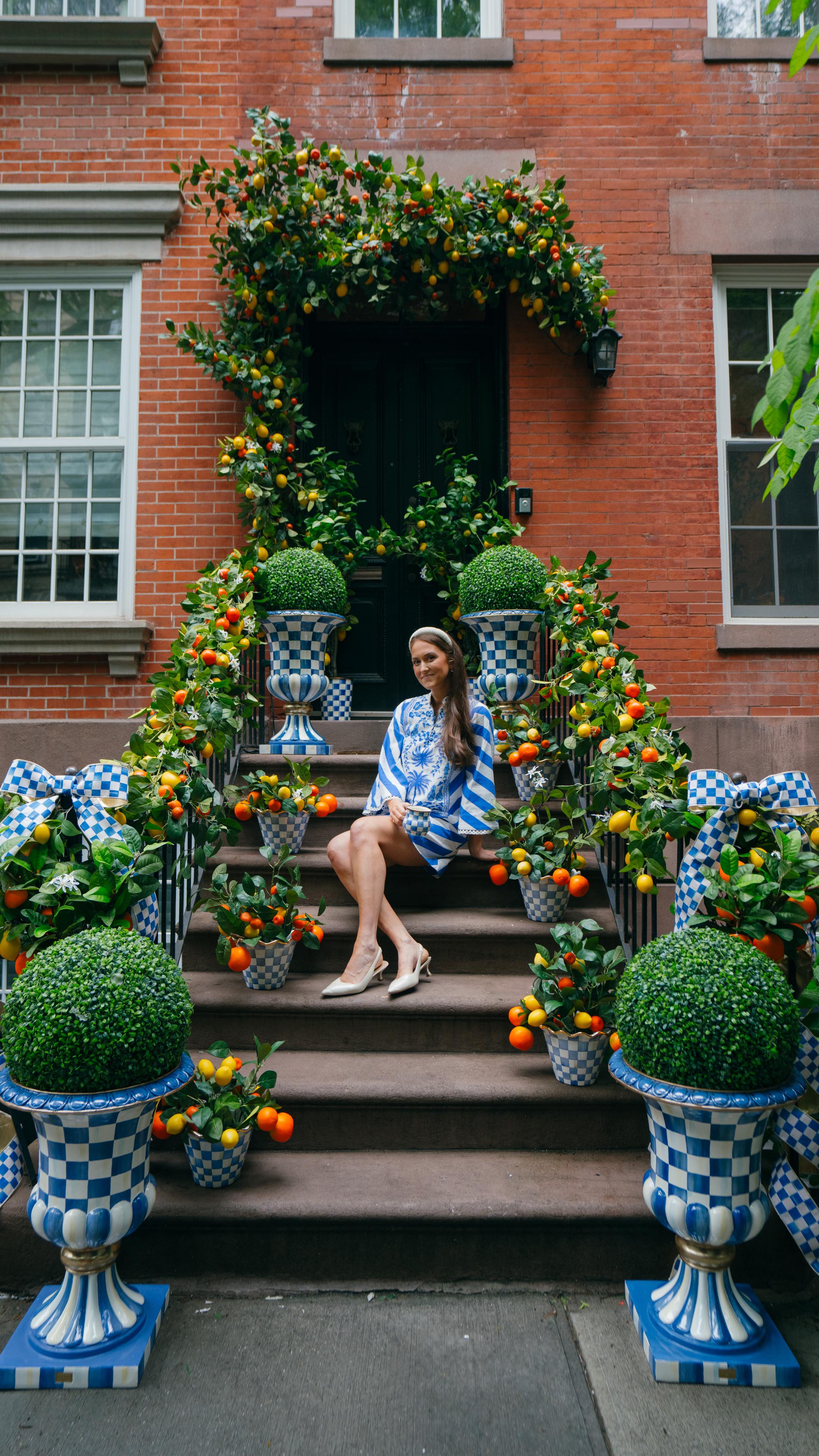 Instagram post by @khemric for Anthropologie. Caption reads: The making of the Summer Stoop! 🍋🍊🍋🍊

After....