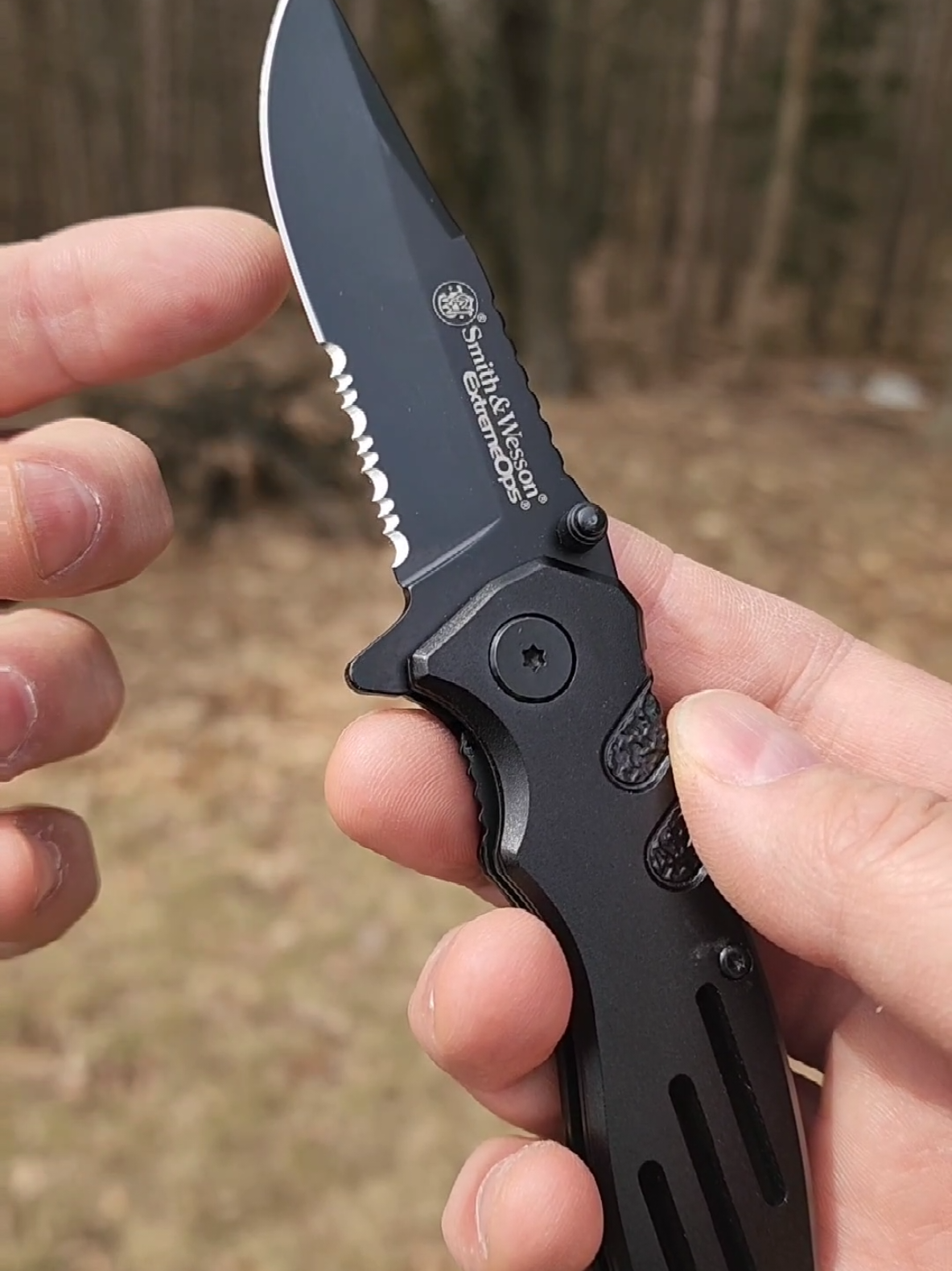TikTok post by @hikerj for BattlBox. Caption reads: Smith and Wesson EDC Pocket Knife @BattlBox #edc....