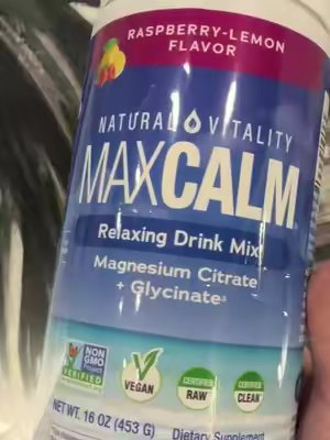TikTok post by @rnlyza for Natural Vitality®. Caption reads: Feeling stressed? Try Max calm....