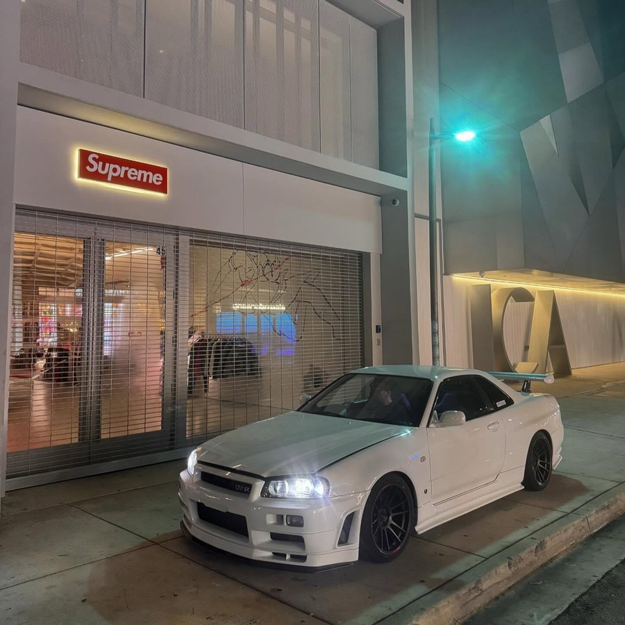 Instagram post by @snot for Supreme. Caption reads: New song dropped rn PRESS + DELETE . Link in bio....