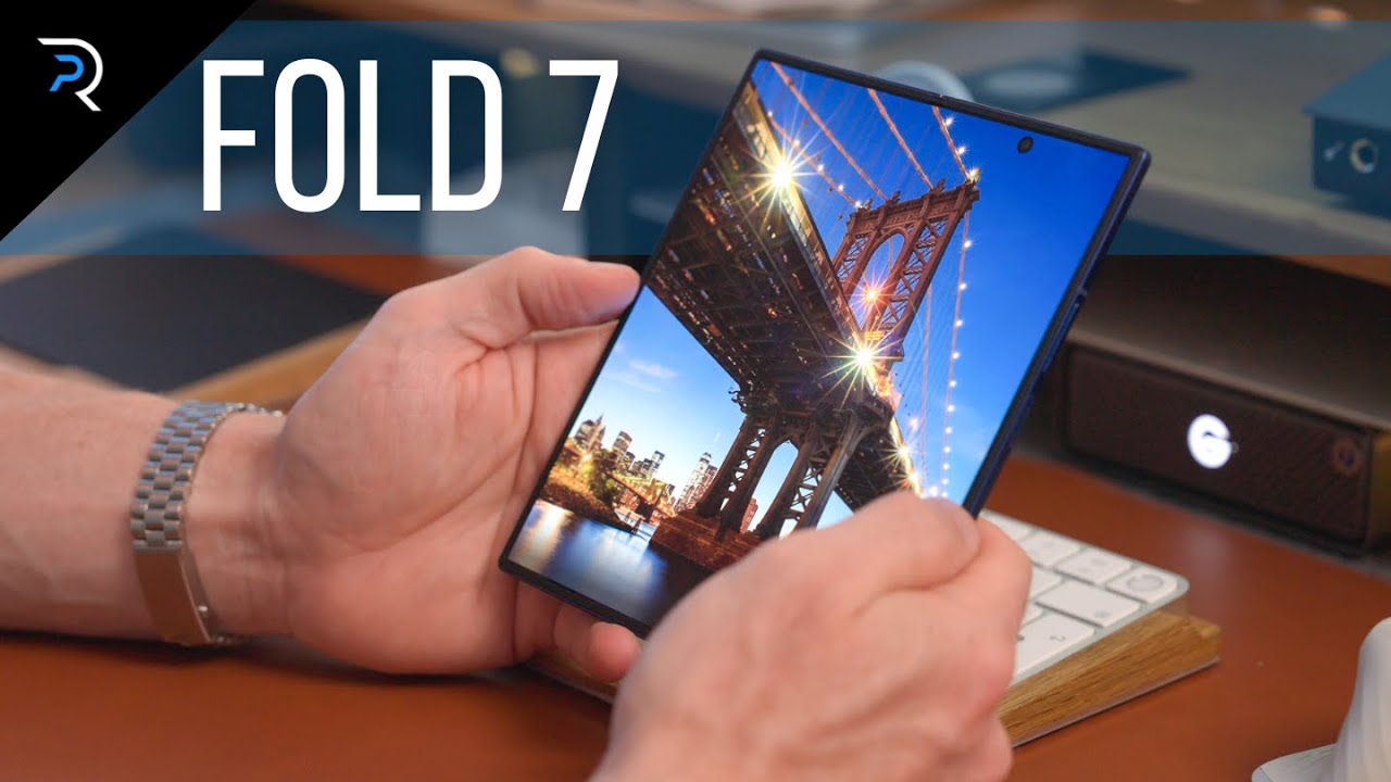 YouTube post by @PatrickRambles for Grovemade. Caption reads: Samsung Galaxy Z Fold 7 - an iPhone user's review!.