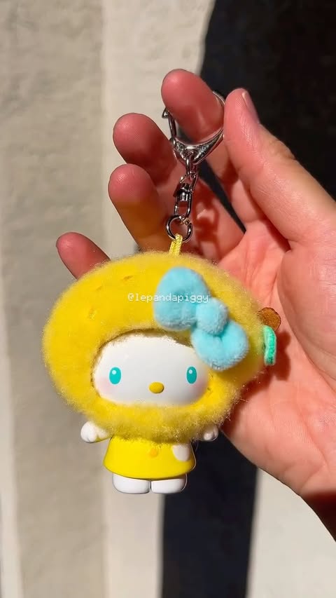Instagram post by @lecubsusa for TOP TOY. Caption reads: [gifted] unboxing TOPTOY x hello kitty fruit house....