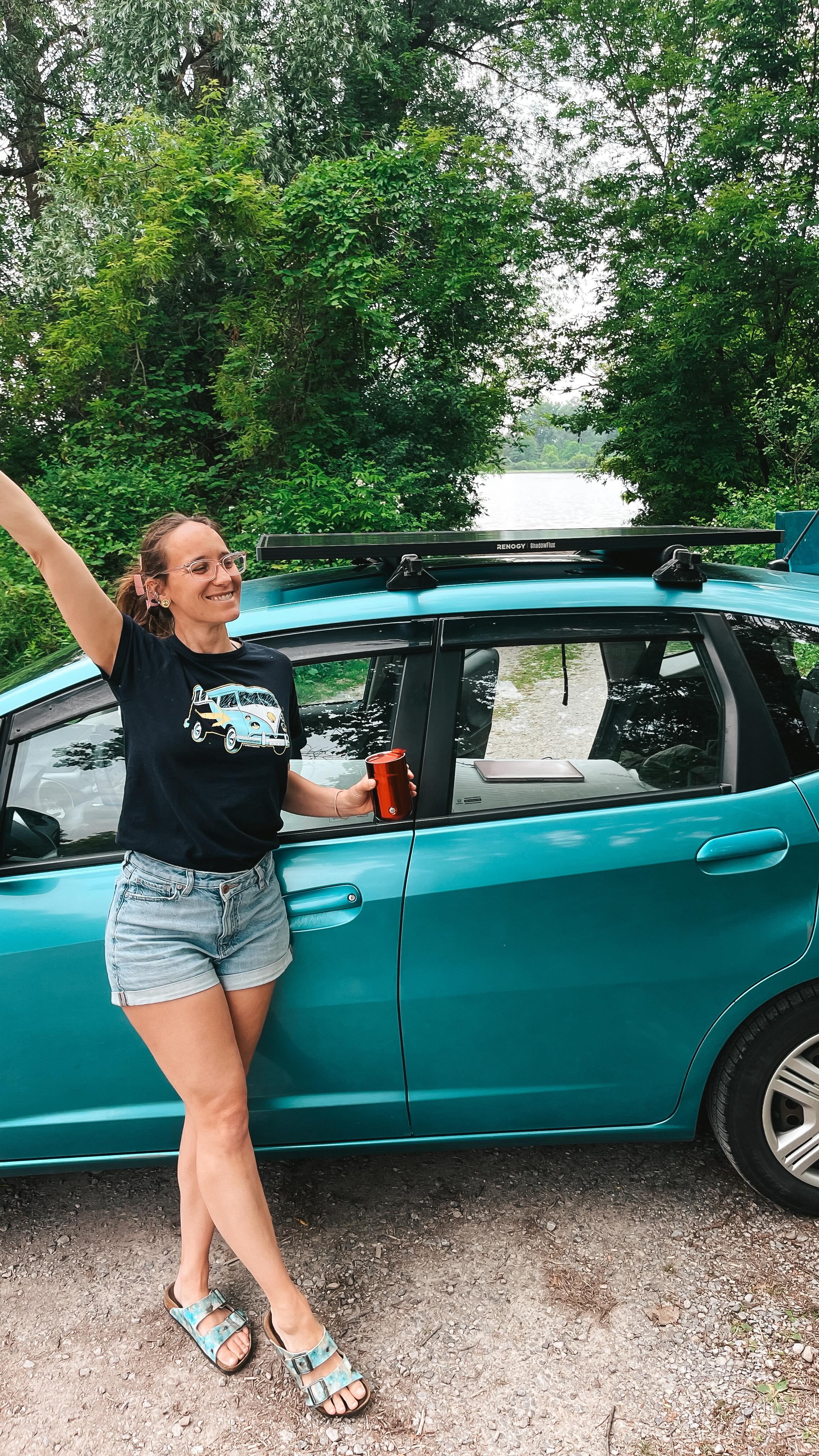 Instagram post by @walkaboottravel for Renogy. Caption reads: 🚙 Living in a tiny car means every piece of gear....