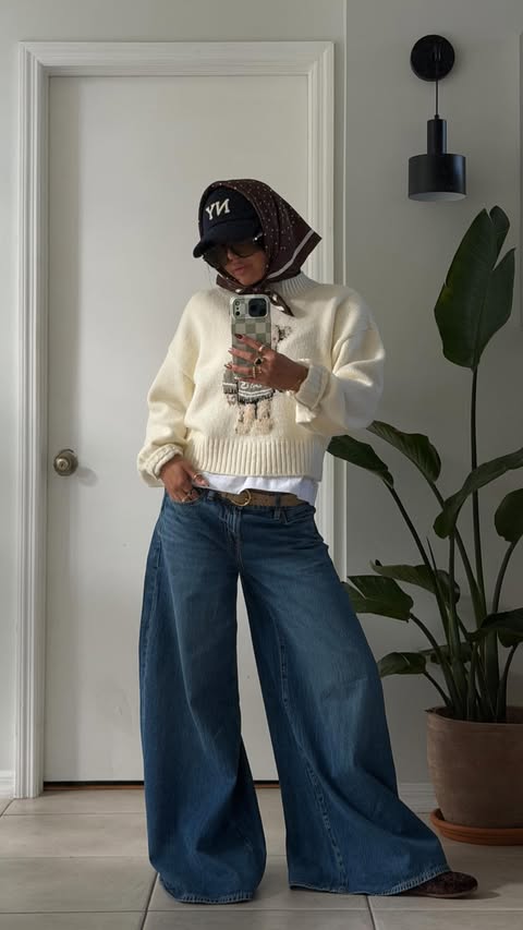 Instagram post by @nicoledelosreyes_ for American Eagle. Caption reads: OOTD 🧸🤎 @americaneagle #ad #AEJeans #AEPartner.