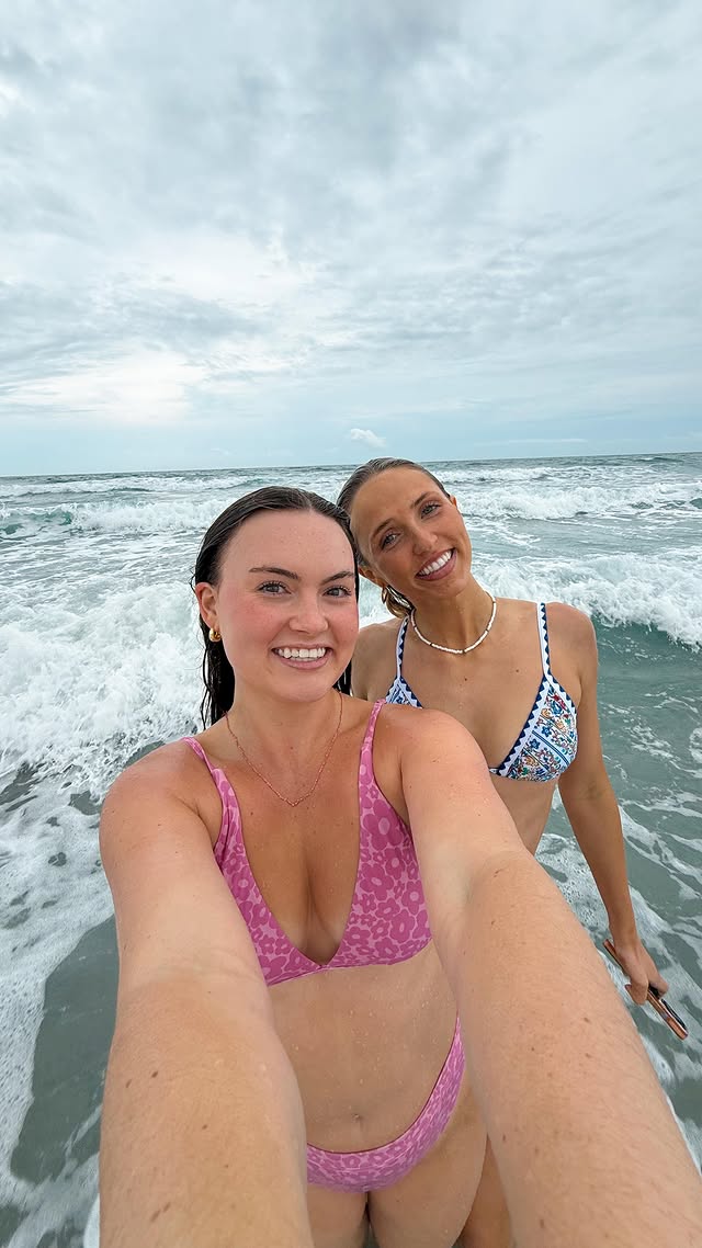 Instagram post by @michaelaarnone for Dippin' Daisy's. Caption reads: [...] do an ocean dunk everyday!! ⛈️👙....