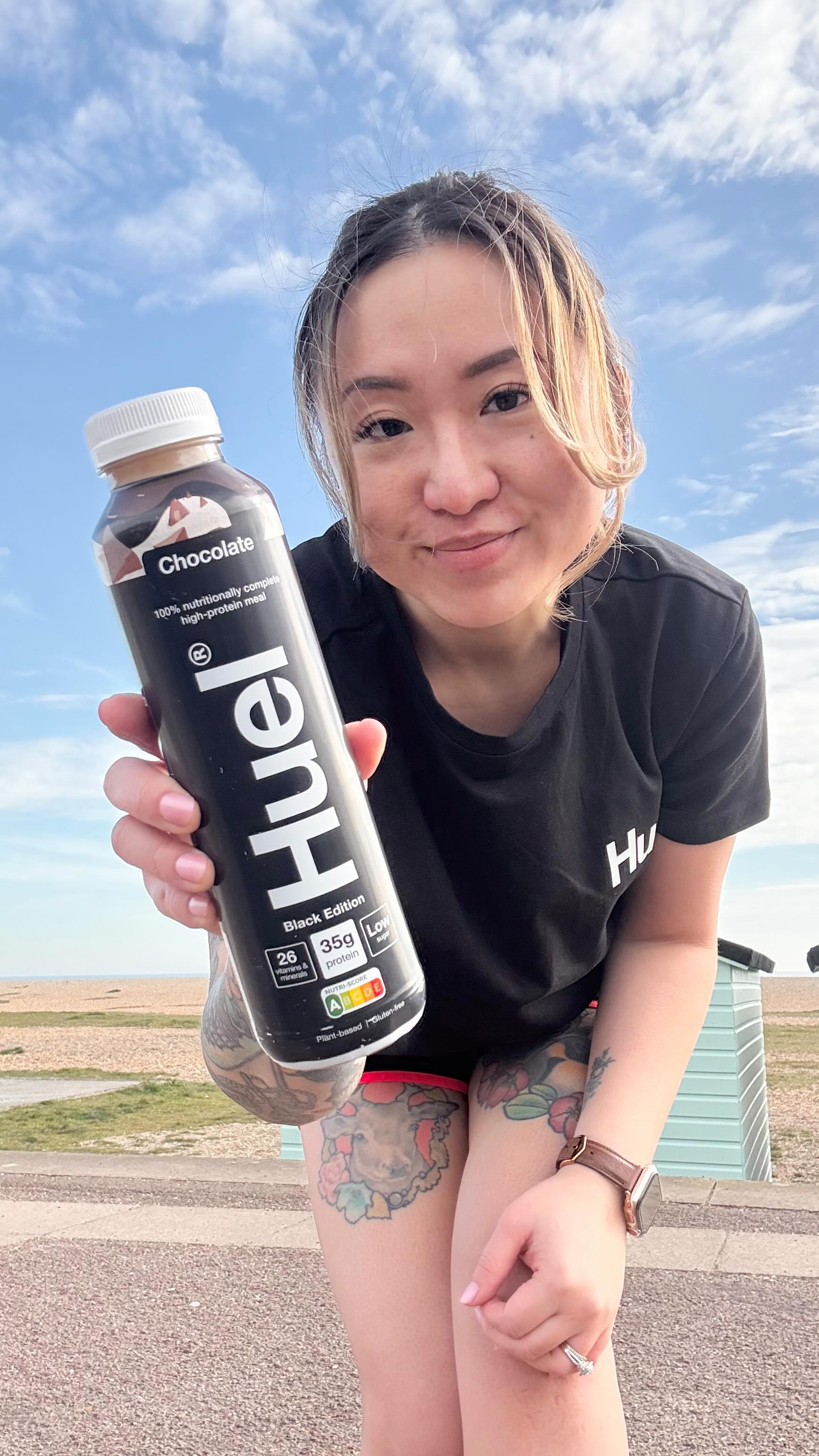 Instagram post by @cinmi.does.makeup for Huel. Caption reads: [...] too! After my run, I grab a Huel....