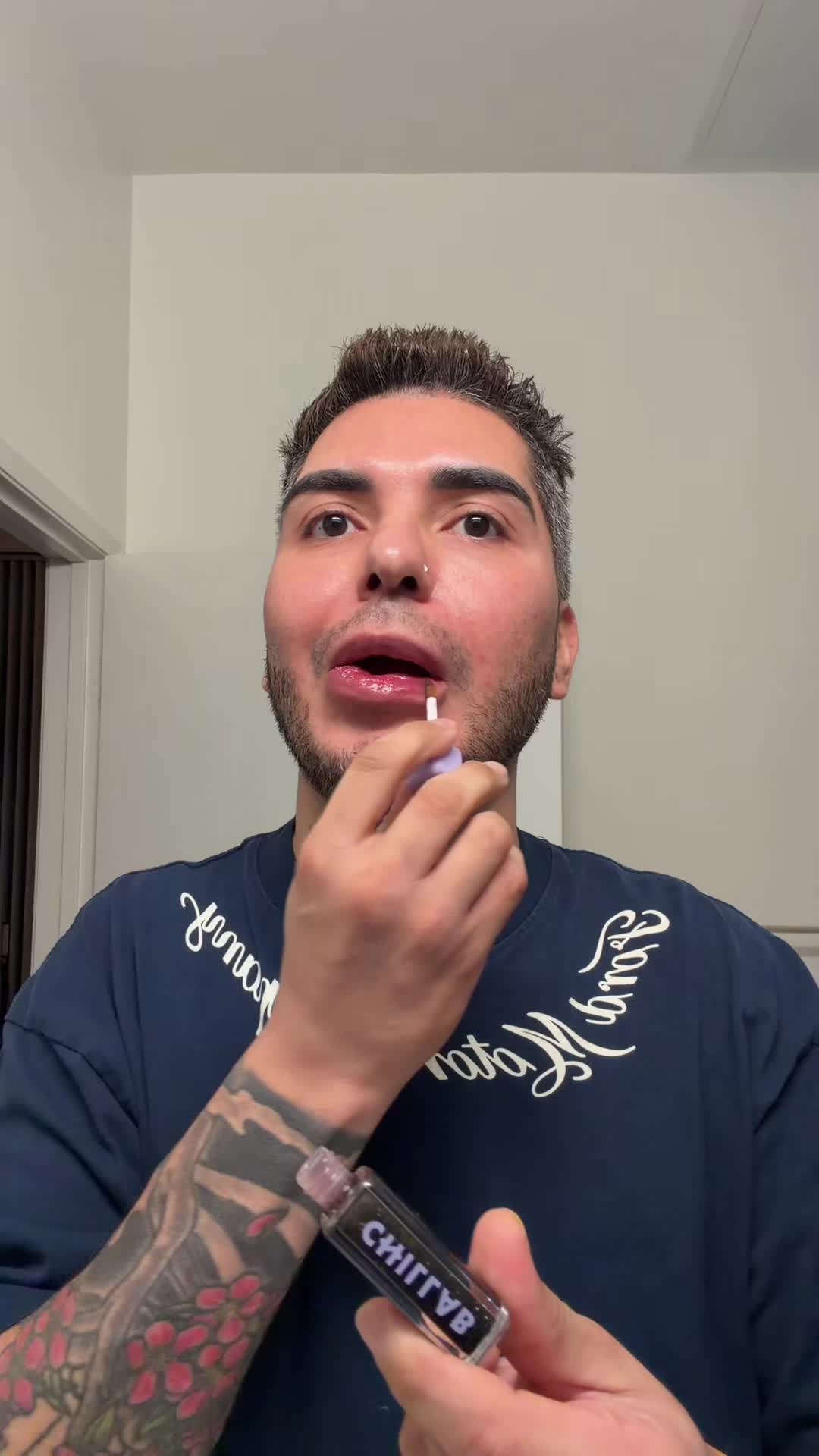 TikTok post by @alekroii for Chillab. Caption reads: @CHILLAB USA magic black lip oil is pretty cool.....