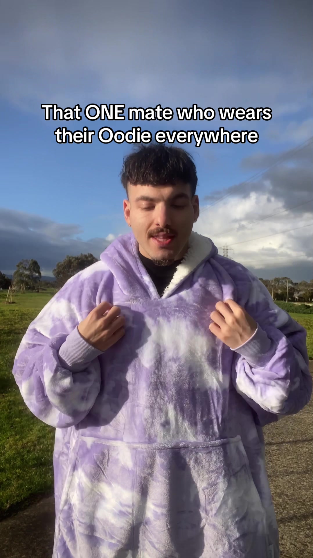 TikTok post by @stossy for The Oodie. Caption reads: Oodies are goated though, Thank you @The Oodie for....