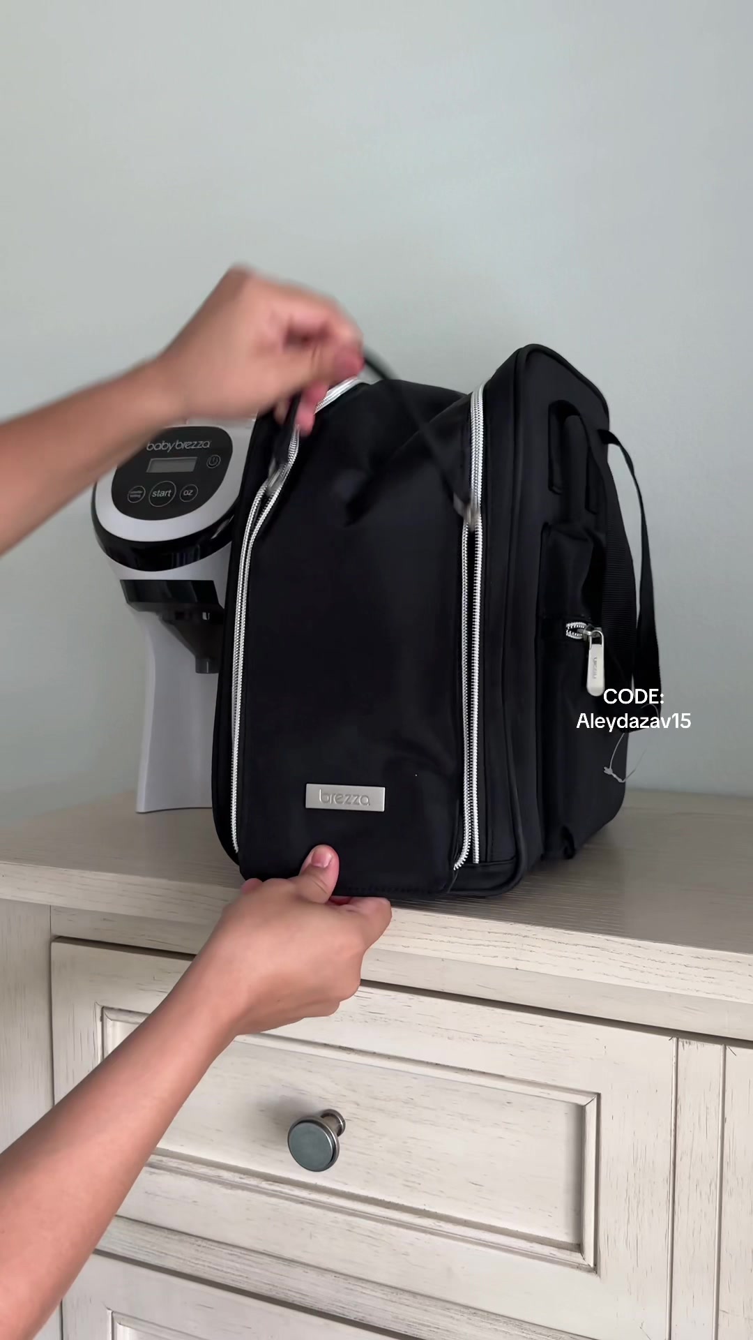 TikTok post by @aleydazav for Baby Brezza. Caption reads: [...] my code for 15$ off 🫶🏼 @Baby Brezza....