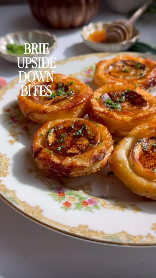 Instagram post by @foodmymuse for Delish. Caption reads: Brie Upside Down Bites for my “Just A Bite” series....