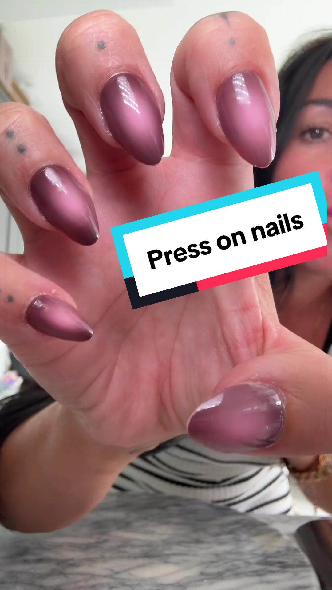 TikTok post by @janinekxx_tiktokfinds for Ellie Young Beauty Shop. Caption reads: Salon-worthy nails in minutes! 💅✨ These Easy....