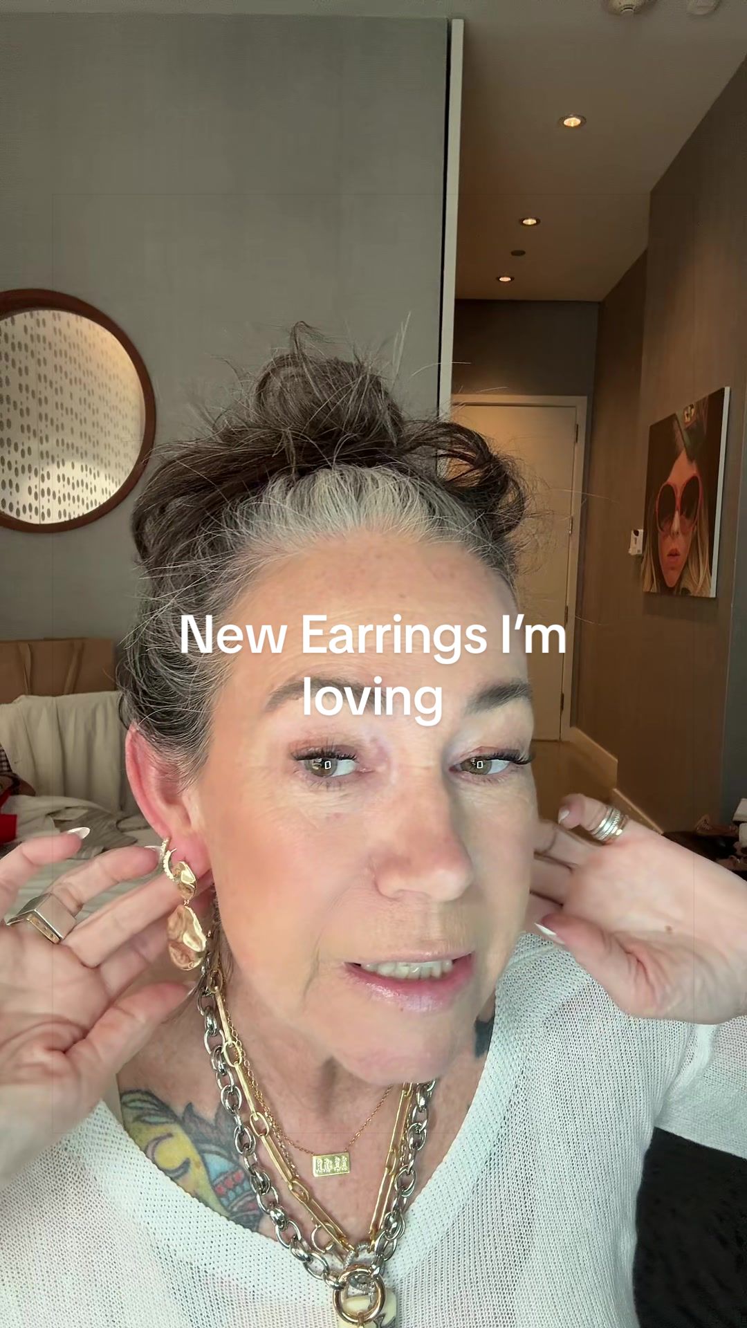 TikTok post by @aestheticaleestyles for Pavoi. Caption reads: @PAVOI new earrings that I’m loving Tarnish [...].