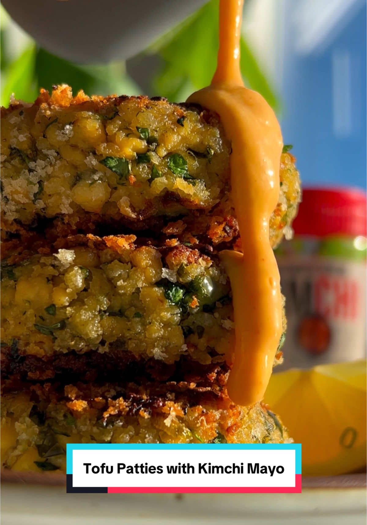 TikTok post by @plantbasedrd for Nasoya. Caption reads: 🌿 Herby Scallion Tofu Patties with a Kimchi Mayo....