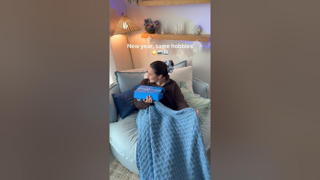 YouTube post by @AshlynnCalee for BookoftheMonth. Caption reads: What’s a hobby you’re bringing into 2026? 🪩🎨.